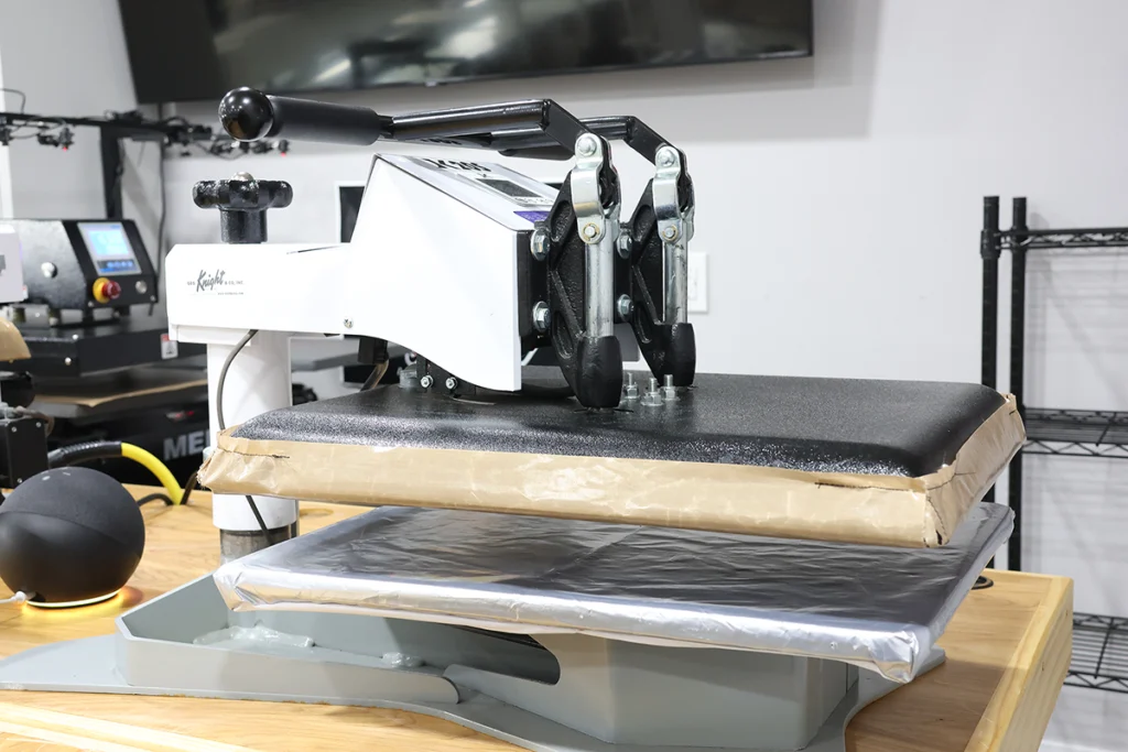 Cougar Bowl Apparel shirt press